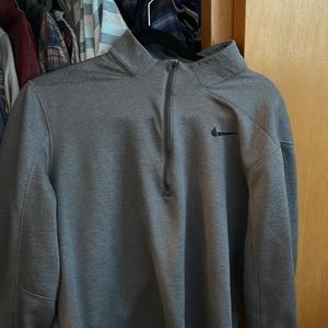 Nike Golf 1/4 zip sweater, size large.